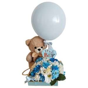 Margaritas y peluche para bebé