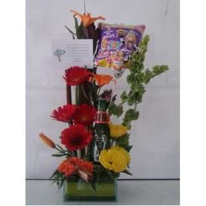 Flores exóticas, cerveza y globo